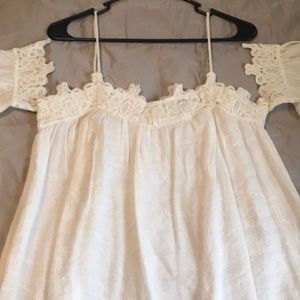 Beautiful white summer blouse. Never worn